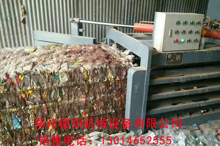 四川省大型垃圾分选打包机 自动捆绳式全自动废纸箱服装液压打捆机