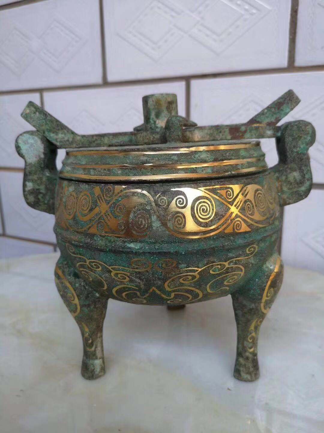 河南青铜器文物复制|鼎形铜行灯|铸铜雕塑制作|人物塑