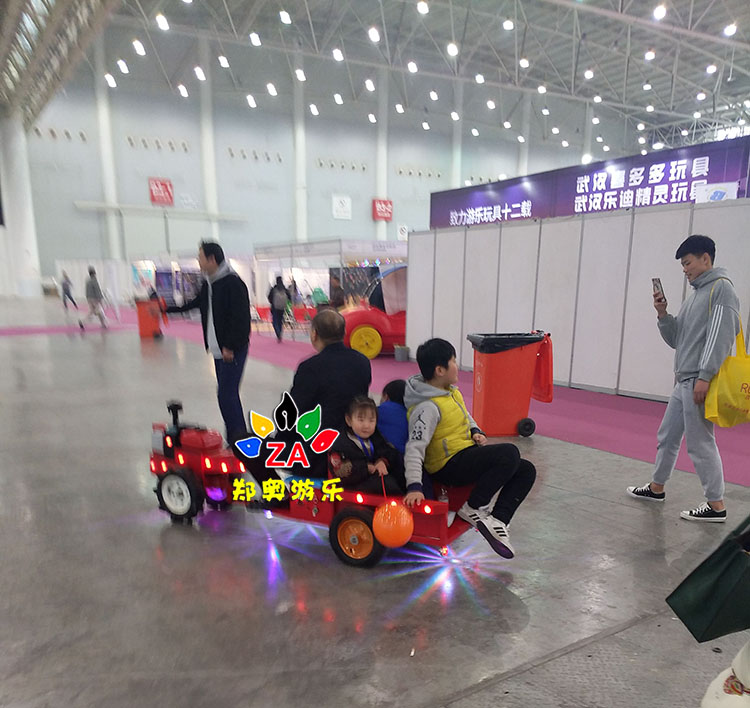 郑奥游乐厂家热销儿童电动手扶拖拉机儿童电动广场车双人双驱电动车
