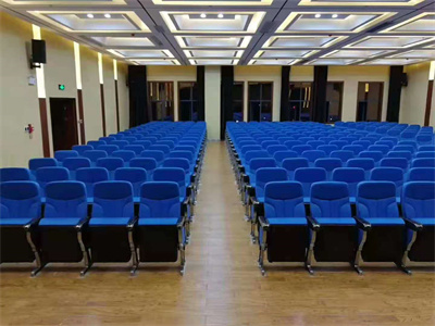 天津礼堂椅定制安装 塑壳剧院阶梯椅 会议厅带写字板座椅