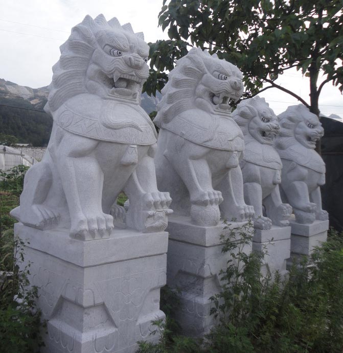 石雕狮子价格一般是多少钱一对 生产石材狮子厂家